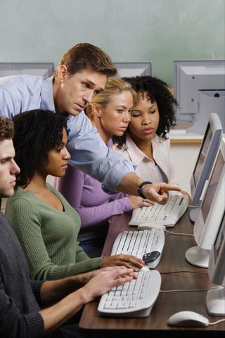 Instructor with Students in Computer Lab – FormsFly Support